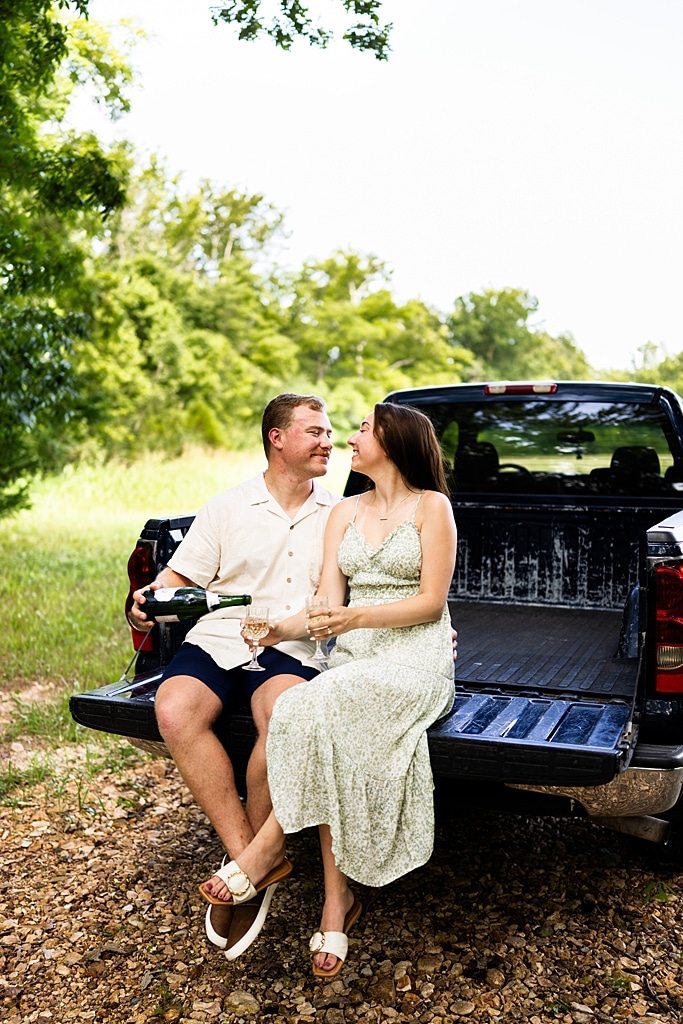 Groom to be proposing during surprise wedding proposal at family home | Emotional reaction during surprise wedding proposal at family home in Missouri | Couple celebrating after surprise wedding proposal at family home | Portraits of newly engaged couple after surprise wedding proposal